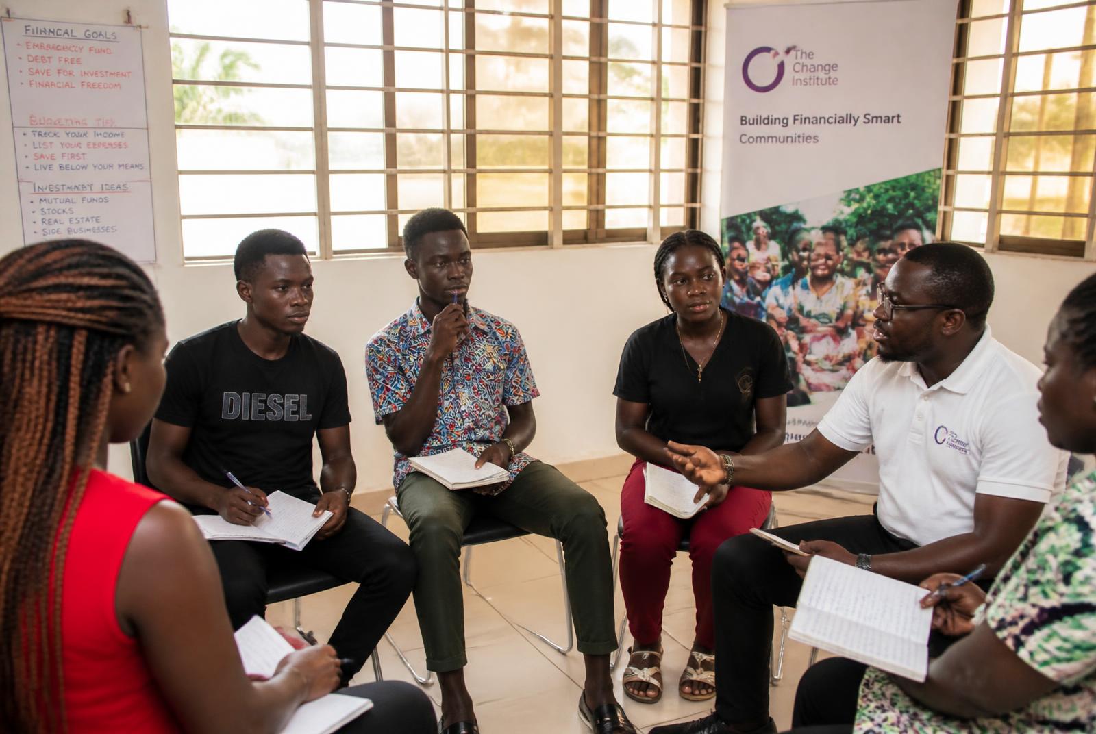 Community financial empowerment workshop in Accra with a facilitator and young participants